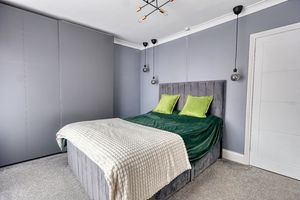 Bedroom One- click for photo gallery